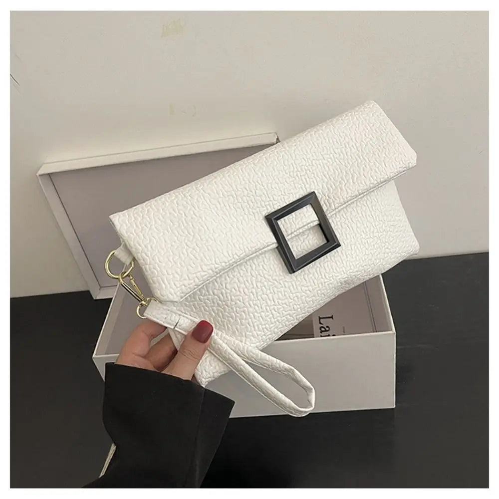 Pochette blanche femme  visuel avec dragonne 