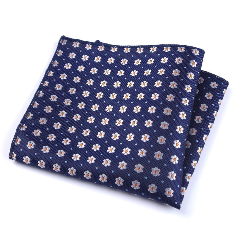 Pochette costume homme Floral jaune blanc. Fond bleu pois blancs