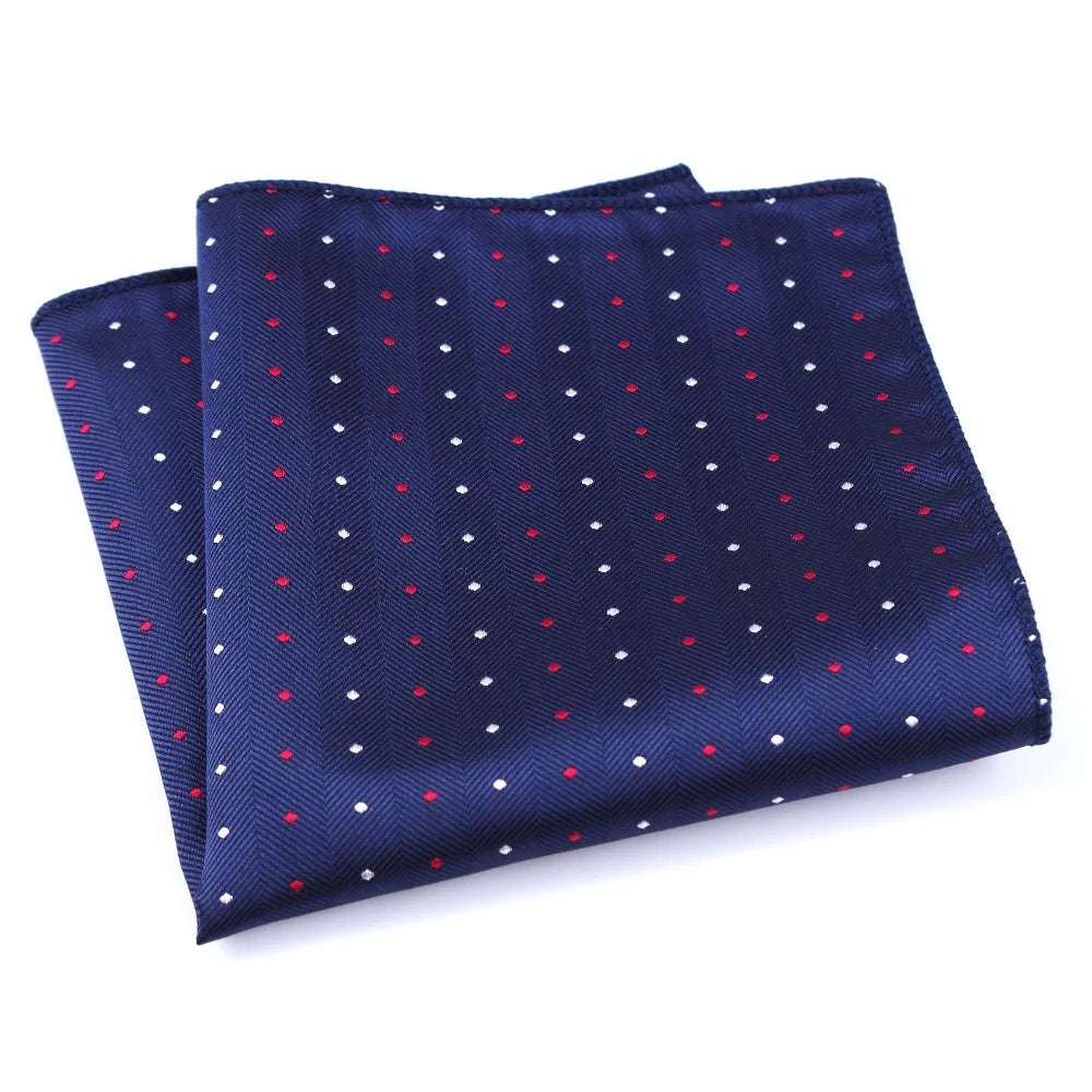 Pochette costume homme pois rouge et blanc sur fond bleu