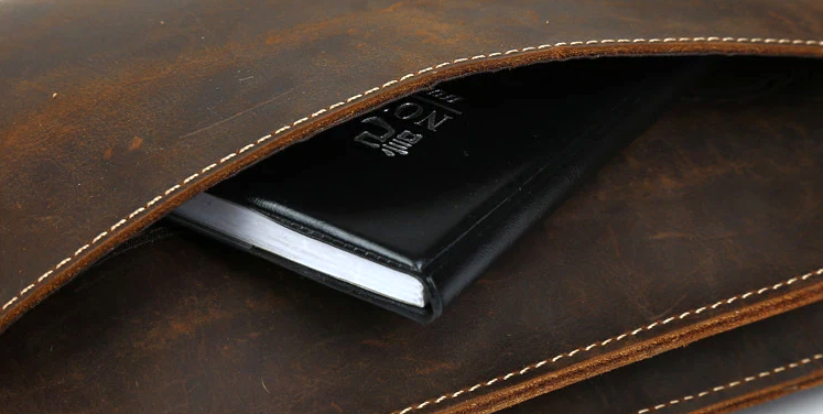 Pochette cuir veritable  dragonne compartiment