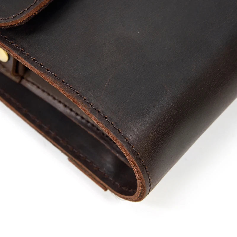 Pochette cuir veritable dragonne piqure sellier  
