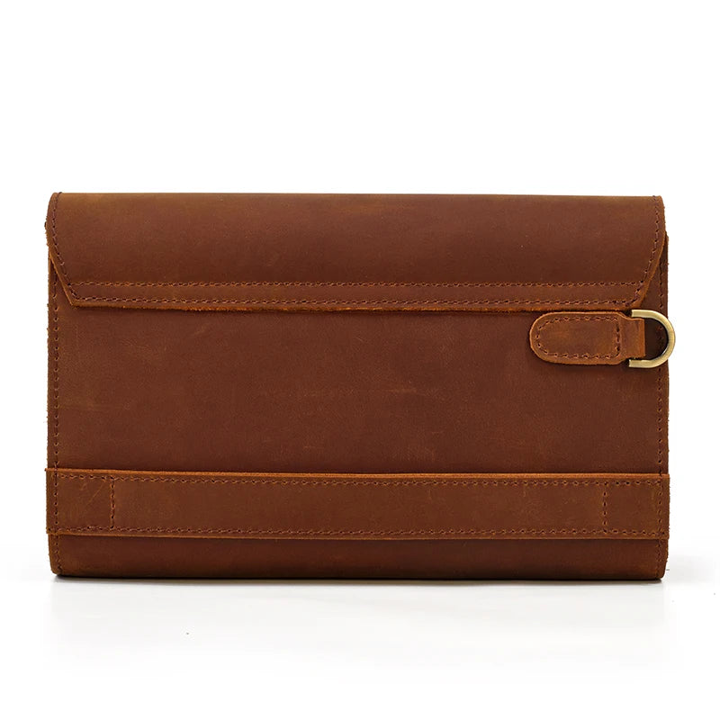 Pochette cuir veritable  dragonne poignee cuir passante