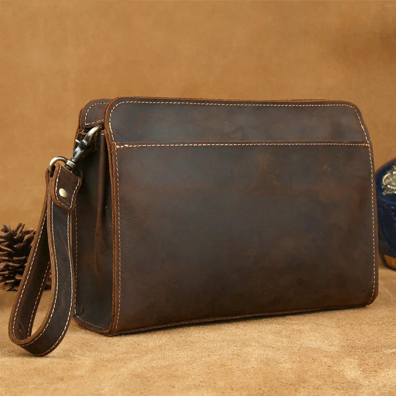 Pochette cuir veritable  dragonne sans rabat 