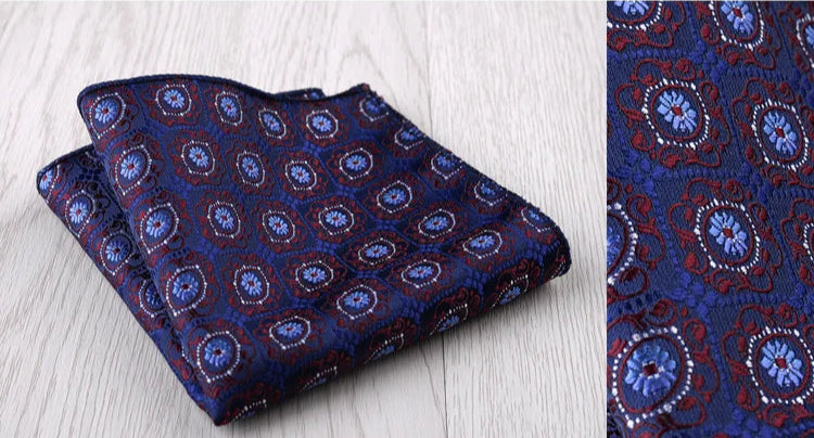 Pochette de costume  bleu nuit et arabesques bleu blanc rouge