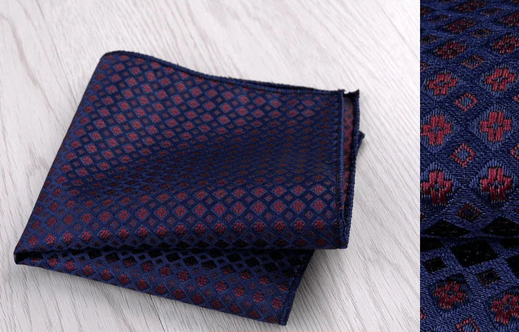 Pochette de costume bleu nuit et croix rouges foncees