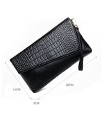 Pochette en cuir femme - Vignette | La Maison de la Pochette