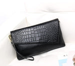Pochette en cuir femme - Vignette | La Maison de la Pochette