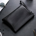 Pochette en cuir pour homme - Vignette | La Maison de la Pochette