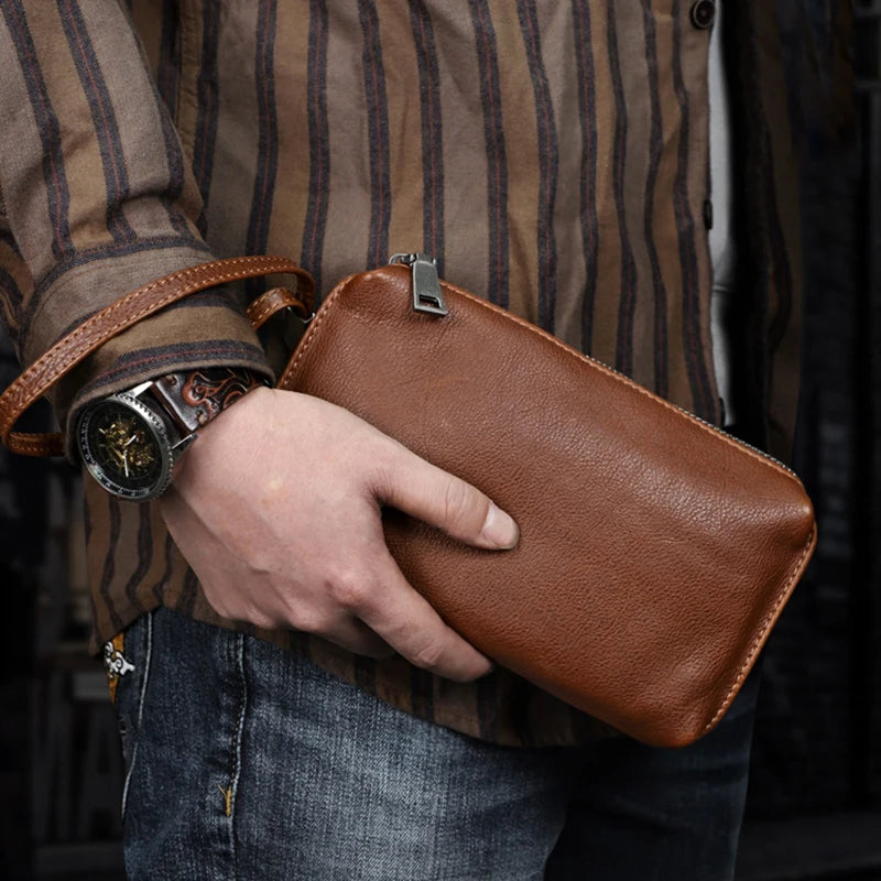 Pochette en cuir veritable dragonne