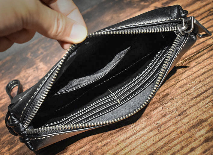Pochette en cuir veritable dragonne ouverte noire vide