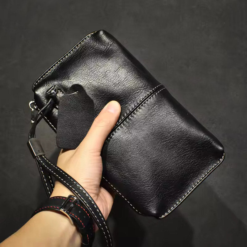Pochette en cuir veritable dragonne prise en main