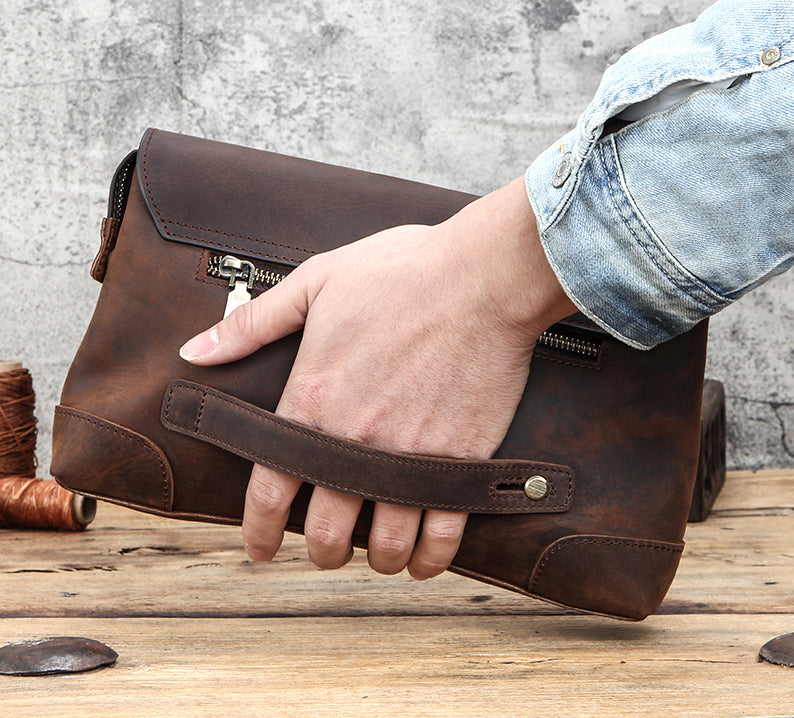Pochette en cuir veritable homme poignee passante en cuir