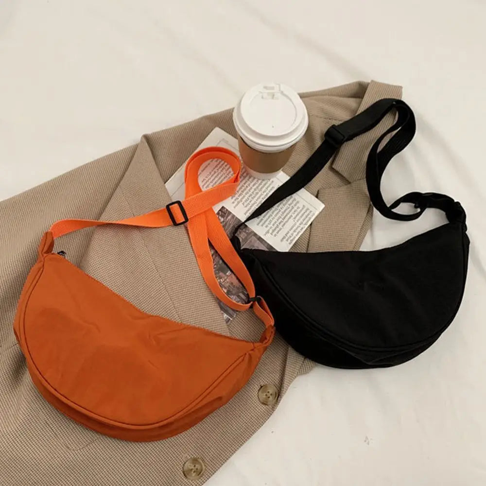 Pochette femme bandoulière visuel orange et noir 