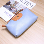 Pochette femme cuir - Vignette | La Maison de la Pochette