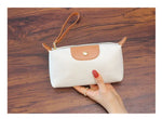 Pochette femme cuir - Vignette | La Maison de la Pochette