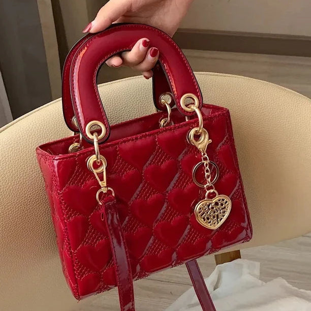 Pochette femme luxe badouliere cœur