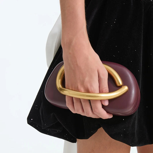 Pochette femme poignee doree