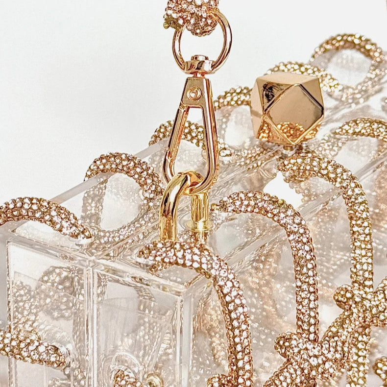 Pochette mariage design acrylique transparente  or detail bandouliere mousqueton fermoir 