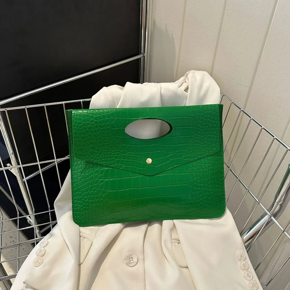 Pochette sac a main poignee effet croco vert emeraude