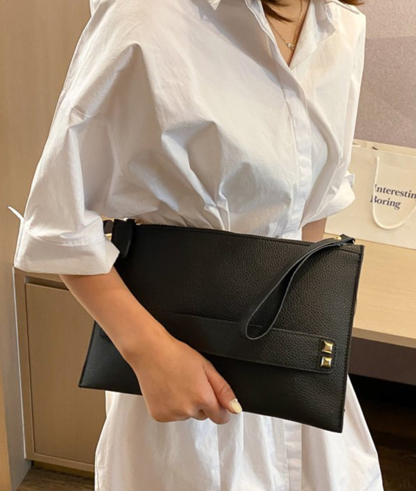 Pochette sac sangle porte main et dragonne noire