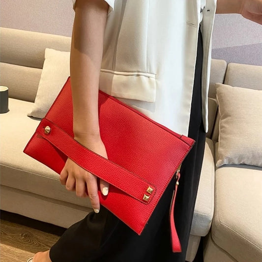 Pochette sac sangle porte main et dragonne