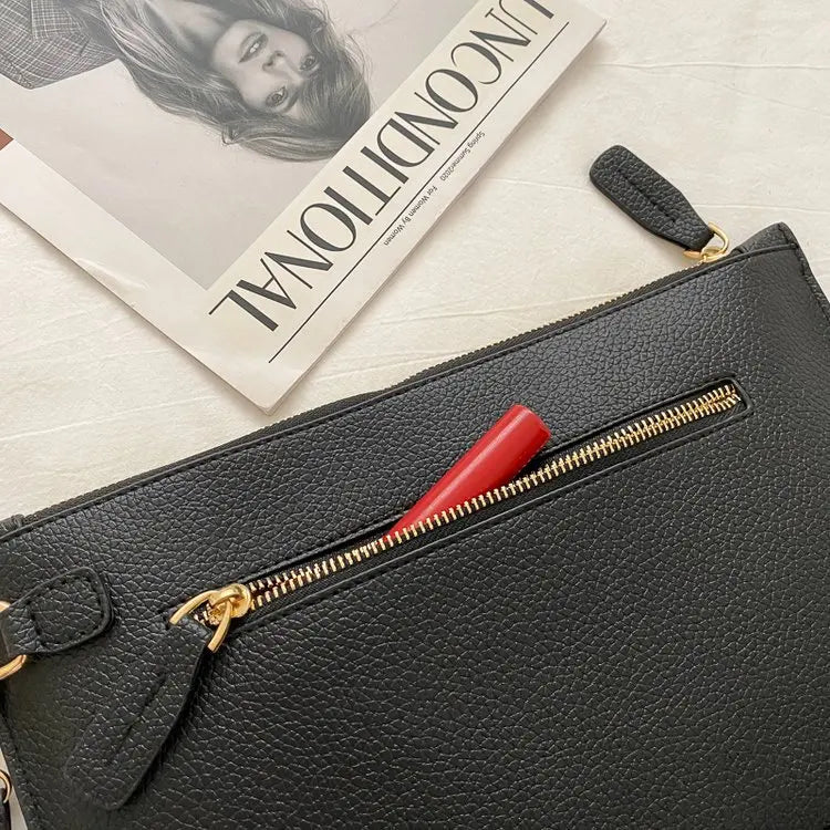 Pochette sac sangle porte main et dragonne poche exterieure fermeture eclair zip