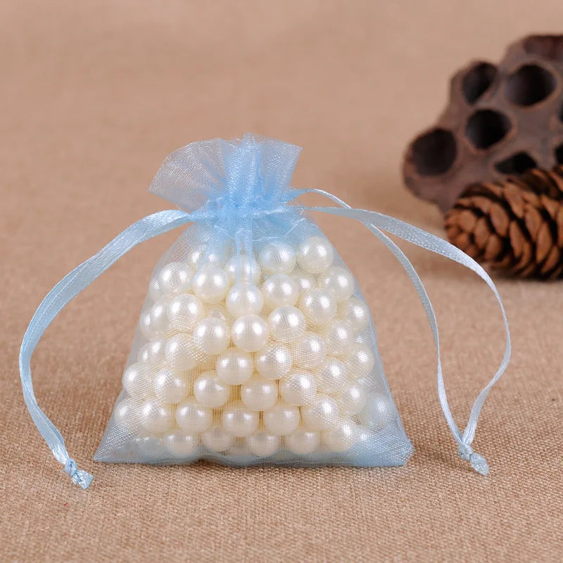 Pochette sachet organza bleu ciel