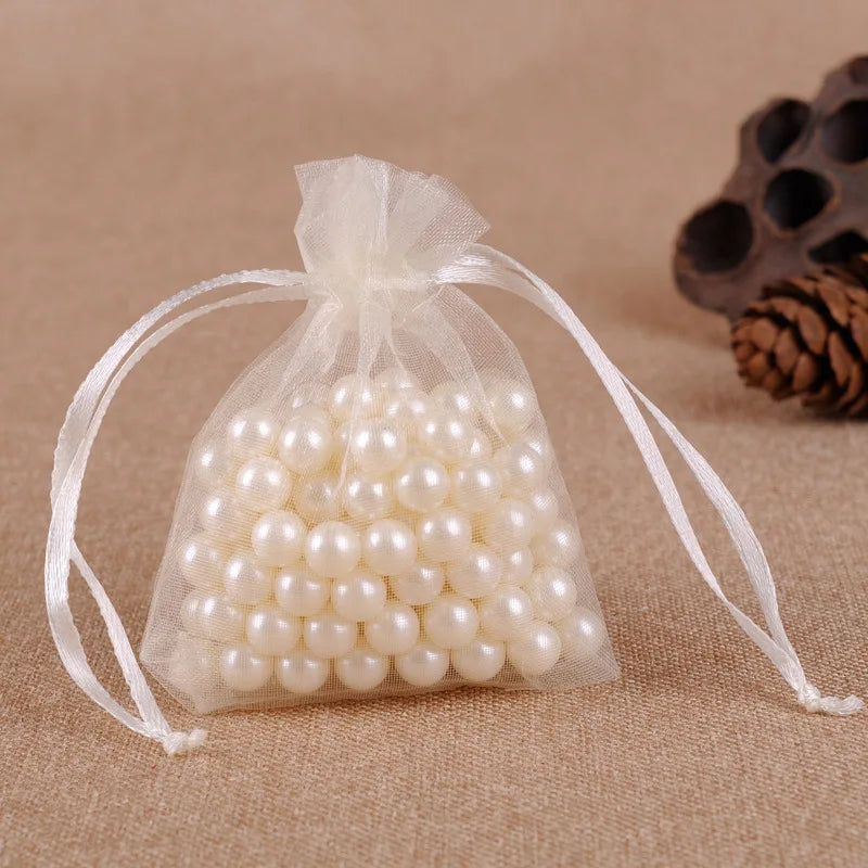Pochette sachet organza ivoire