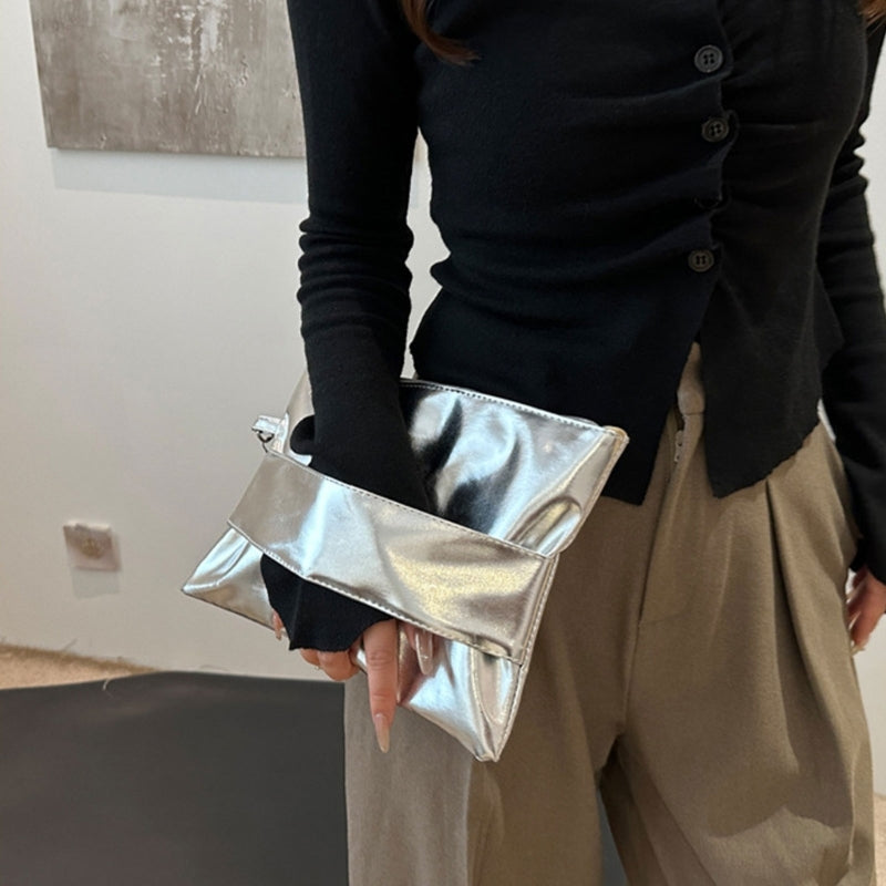 Sac et pochette poignee laterale