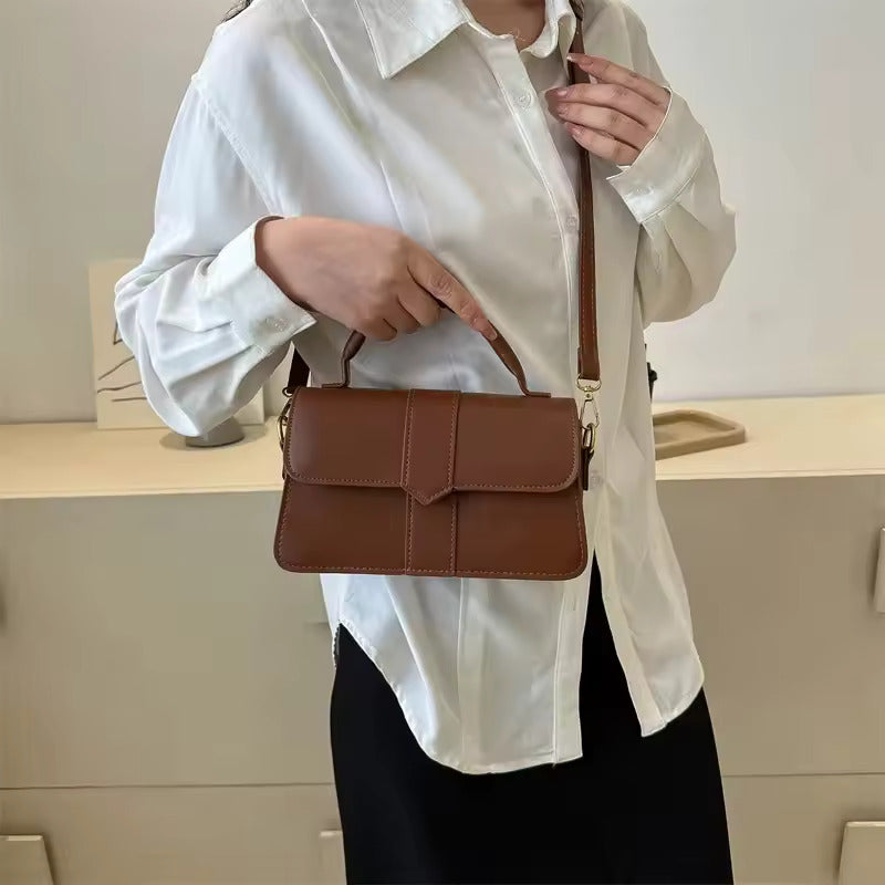 Sac main pochette bandoulière poignee 