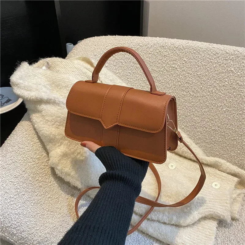 Sac main pochette caramel