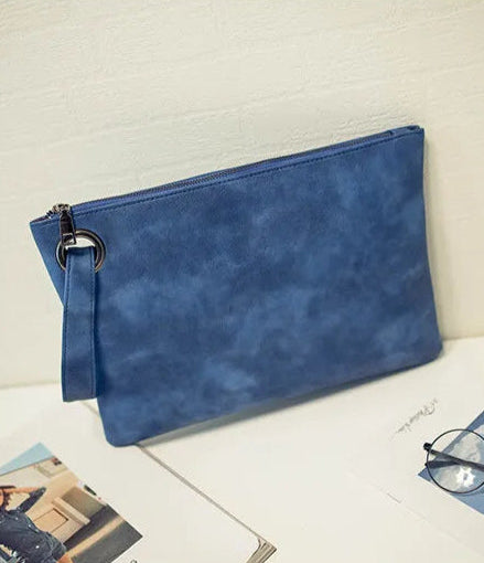 Sac pochette femme effet cuir bleu marbré