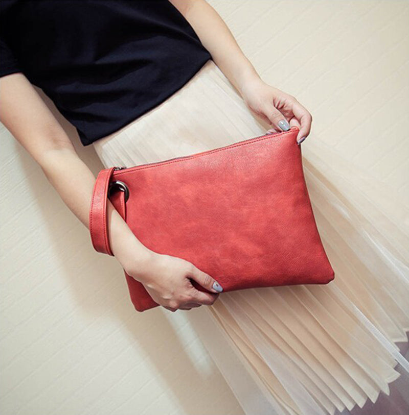 Sac pochette femme effet cuir dragonne