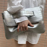 Sacs pochettes - Vignette | La Maison de la Pochette