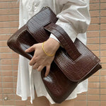 Sacs pochettes - Vignette | La Maison de la Pochette