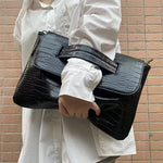 Sacs pochettes - Vignette | La Maison de la Pochette