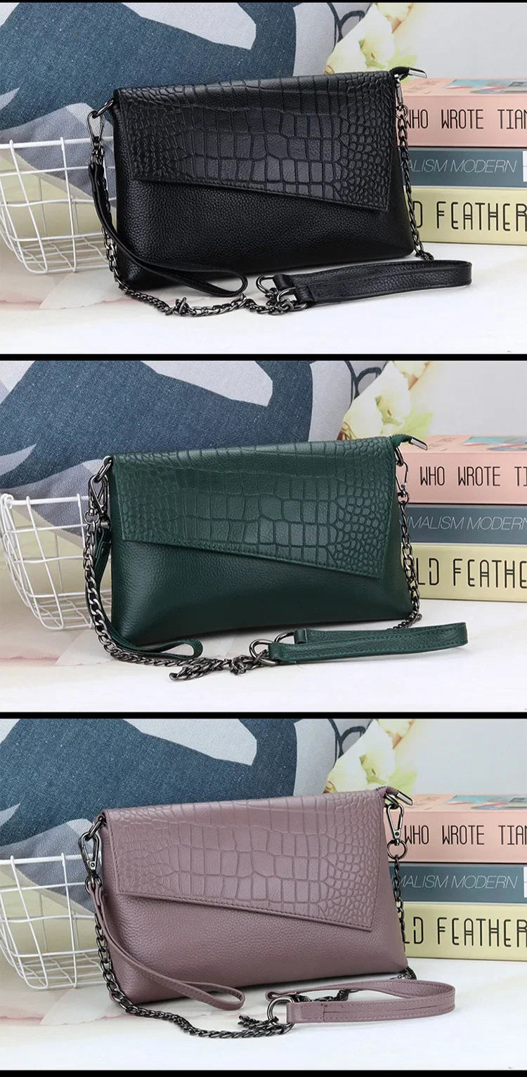 pochette femme cuir coloris noir vert et violine 